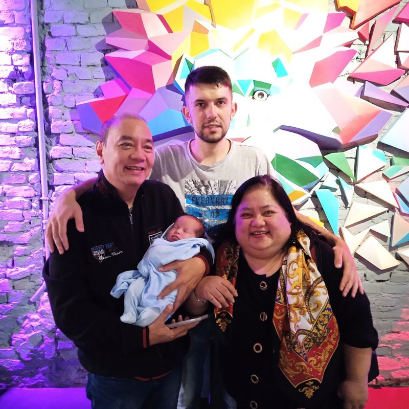 Andrew Khodonovych with the Averia family and newborn Baby Jesson in Kyiv — Novaparent surrogacy founder